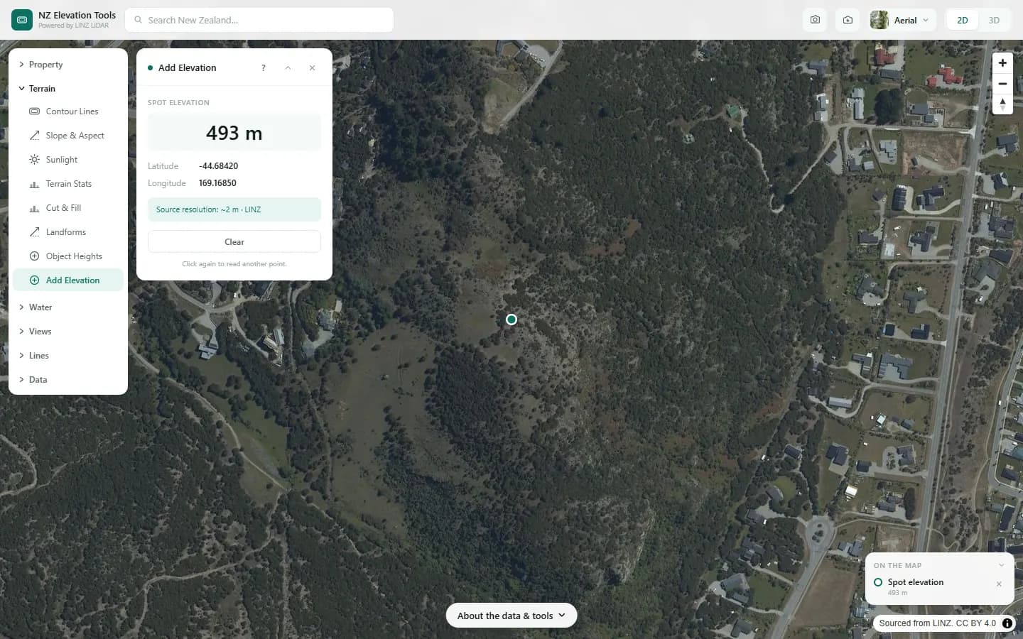 Spot elevation of 493 m shown in the panel with the point marked on the map